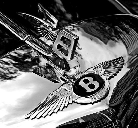 649px-Bentley_badge_and_hood_ornament-BW